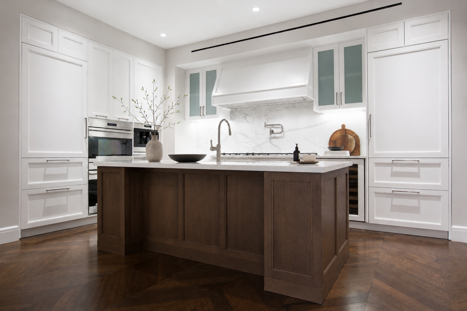 Novecento kitchen — contemporary composition with sculptural island and matte cabinetry